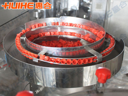 自立袋灌裝機(jī)理蓋部分展示